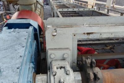 How Does a Buried Scraper Conveyor Handle Hot or Abrasive Materials at Steep Inclines